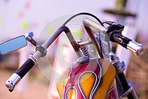 The view over the handlebars of motorcycle.