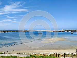 View over harbour of Povoa de Varzim, Portugal on a sunny summer day with blue sky