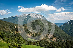 View over hills to PodolÅ¡eva to mountain Raduha in Slovenia