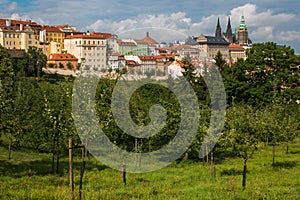 View over historic center of Prague with castle absorbed in the green