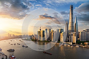 View over the Huangpu river to the modern skyline of Shanghai, China