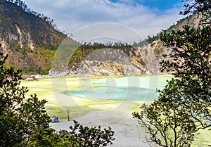A view over the Kawah Putih volcanic crater lake, Indonesia photo