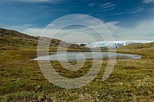 View over a lake towards the glacier front, Point 660, Kangerlussuaq, Greenland