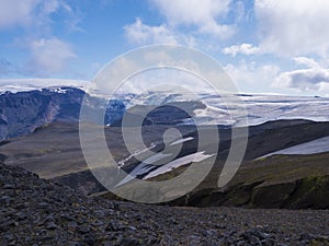 View over a landscape of Godland and thorsmork with the Eyjafjallajokull glacier and volcano, lava formations, snow, ice