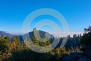 View over the mountain landscape and over the clouds