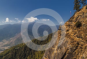 View over the mountains in Bhutan on the way to Taktshang GoembaTiger`s Nest Monastery, the most famous Monastery in Bhutan, in