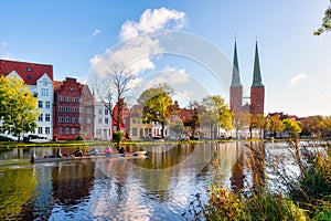 View over the Muehlenteich pond to the buildings and Cathedral of Luebeck at the Baltic Sea, Schleswig-Holstein