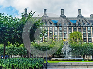 View over the New Palace Yard of the Westminster Palace showing its garden and the fountain to the Portcullis House, London, UK. photo