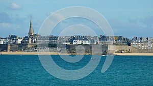 View over ocean bay from Dinard on citiyscape of breton town Saint Malo against dizzy sky