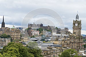 View over the old town of Edinburgh with Castle historic Balmoral Hotel to castle hill