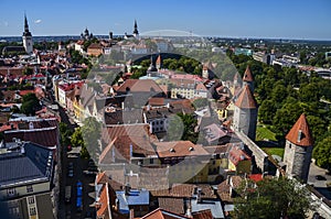 View over the Old Town with the towers of the City Walls and Oleviste Church from Patkuli Viewing Platform. Tallinn, Estonia