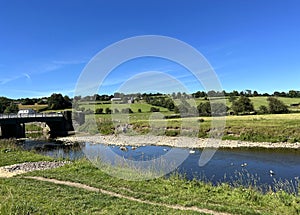 View over the, River Ribble, with fields and trees in, Chatburn, Clitheroe, UK photo