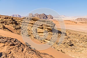 A view over rocky outcrops in the desert landscape in Wadi Rum, Jordan