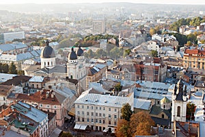 view over the roofs of houses in the old city of Lviv, a beautiful sunset light, European architecture