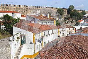 View over the roofs and the whitewashed houses of Obidos at the defensive wall, Portugal