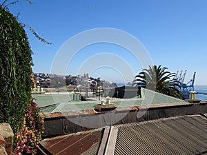 view over the rooftop to the colorful houses of Valparaiso, touristy city in Chile photo