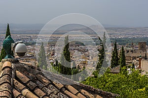 A view over the rooftops of the Albaicin district towards Granada