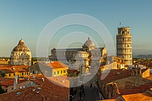 A view over the rooftops of Pisa towards the Cathedral Square, featuring the Cathedral, the Tower & the Baptistry, taken just afte