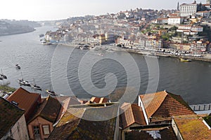 View over rooftops and River Douro to Porto, Portugal.