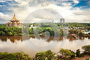 View over the Sarawak River to the north side of the city of Kuching with DUN complex and Fort Margherita, Borneo