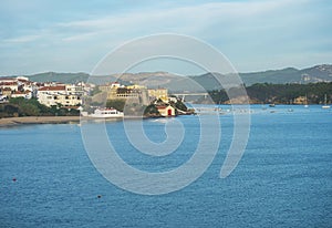 View over the sea on Vila Nova de Milfontes with Praia da Franquia sand beach, mouth of Mira river, Forte de Milfontes photo