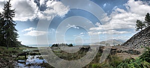 A view over sunny cardigan bay from the hills above