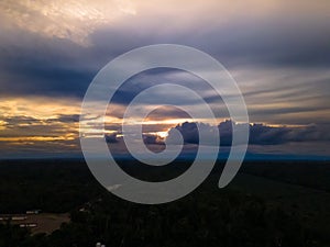 View over sunset over Amazon river with rainforest in Brazil.