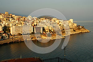 View over the town of Kavala, Greece, at sunset photo