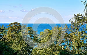 View over the treetops on the Baltic Sea. Lohme on the island of RÃ¼gen