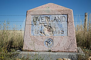 A view of the Overland trail with a historical Marker dated 1862-1868