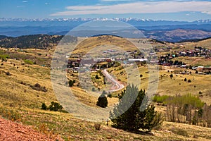 View overlooking the town of Cripple Creek, Colorado with mountains in background