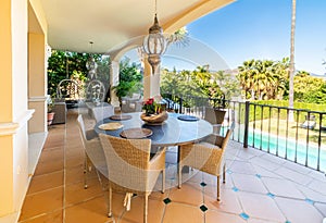 A view overlooking a villa pool from terrace