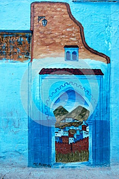 view of a painted wall in the blue city of Chefchaouen, Morocco