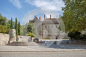 View at the Palace of the Dukes of Braganza front facade piazza , and Dom Afonso Henriques statue on Guimaraes city downtown