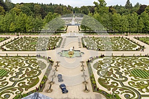 View of the palace gardens including two antique cars, from the roof terrace of Paleis het Loo in Apeldoorn, Netherlands photo