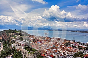 View from Palamidi on Nafplio city in Greece with port, Bourtzi fortress, and blue Mediterranean sea