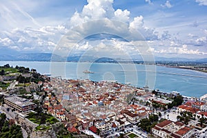 View from Palamidi on Nafplio city in Greece with port, Bourtzi fortress, and blue Mediterranean sea