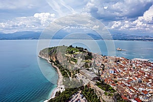 View from Palamidi on Nafplio city in Greece with port, Bourtzi fortress, and blue Mediterranean sea