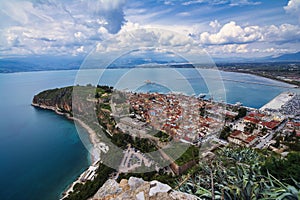 View from Palamidi on Nafplio city in Greece with port, Bourtzi fortress, and blue Mediterranean sea