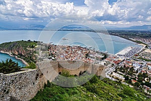 View from Palamidi on Nafplio city in Greece with port, Bourtzi fortress, and blue Mediterranean sea