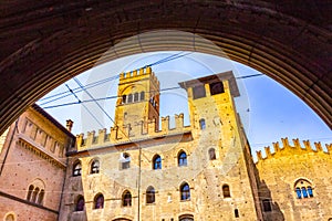 View of Palazzo Re Enzo Torre Lambertini from arch Bologna Italy