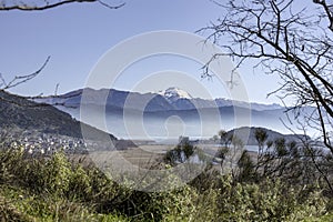 View of Pamvotis lake.Houses and fields,Ioannina city, Epirus, Greece