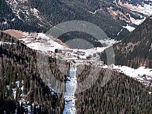 View of the Panorama and the village of Corvara from Piz Boe in the Sella Group, Alps Mountains, Italy photo