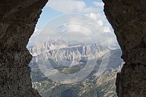 View of panoramic landscape from mountain tunnel window, Dolomites, Italian Alps