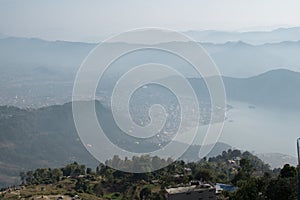 View of paragliders over Pokhara, Nepal from Sarangkot hill