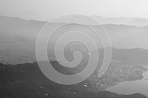 View of paragliders over Pokhara, Nepal from Sarangkot hill