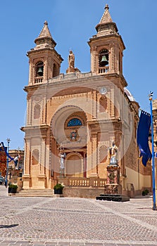 The view of the parish church in the Marsaxlokk fishing village, Malta