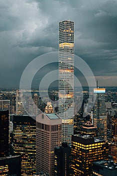 View of 432 Park Avenue and buildings in Midtown Manhattan at night, in New York City photo