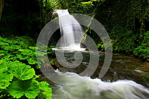 View of part of the Cascata delle Marmore waterfall with a silky water in the town of Marmore, Terni, Italy