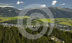 A view of part of the town of Liptovsky Mikulas, the Podbreziny housing estate and the mountain massif Western Tatras with peaks